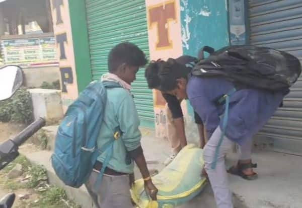 பள்ளி மாணவர்கள் சிமெண்ட் மூடை தூக்கும் அவலம்....! பொதுமக்கள் அதிருப்தி...! 